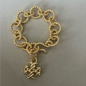 Tory Burch Chunky textured Gold tone Chain Bracelet with hanging logo